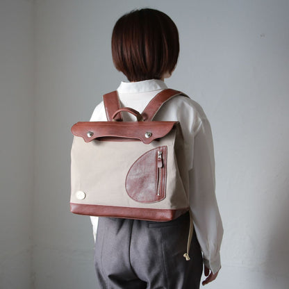ポストマンリュック ｜ ガバッと開く リュック 横型 帆布 牛革